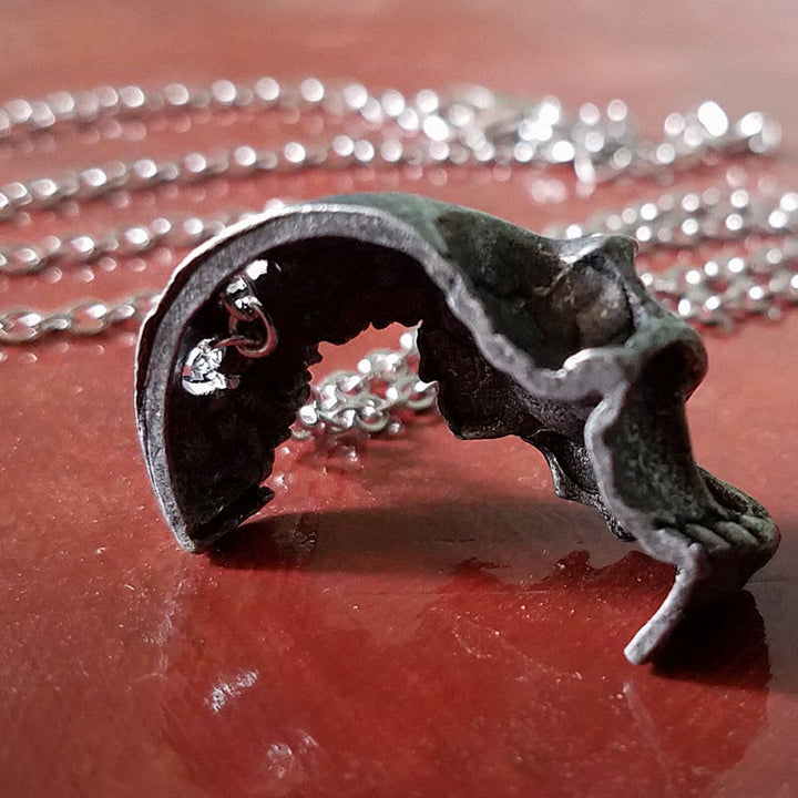 FREE Today: Damaged Half Face Skull Necklace