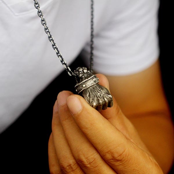 WorldNorse Powerful Fist of Fate Hammering Gesture Necklace - image 1