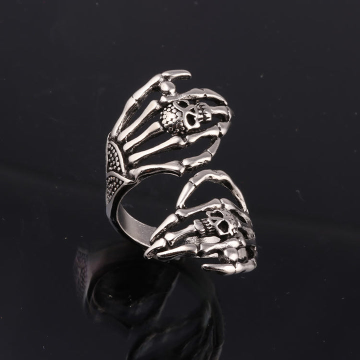 FREE Today: Dark Skull Double Hand Grab Ring