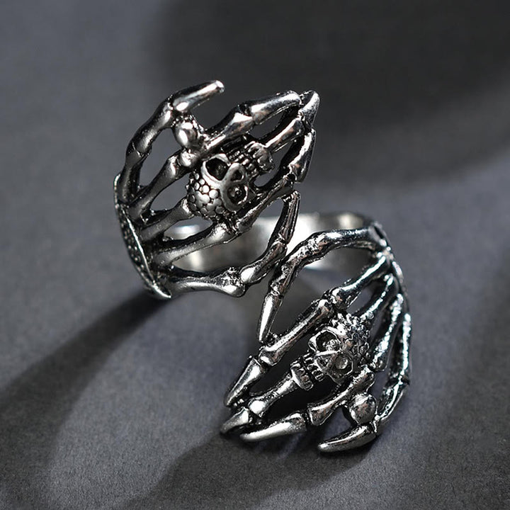 FREE Today: Dark Skull Double Hand Grab Ring