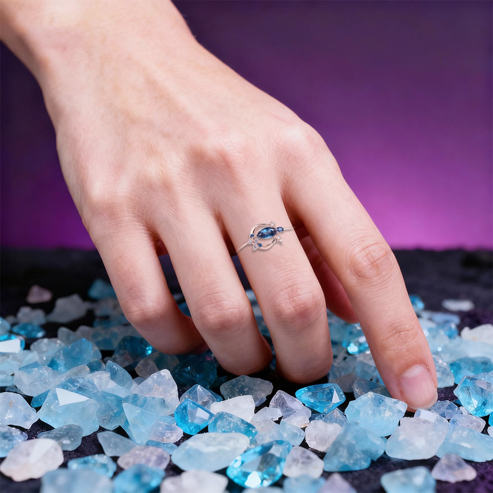 FREE Today: Blue Topaz Moon Bat Ring - image 1