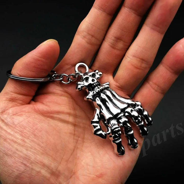 WorldNorse Skull Ghost Head Skull Claw Hand Keychain