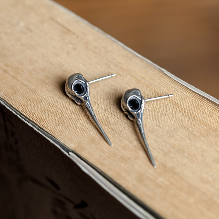 WorldNorse Hummingbird Skull Stud Earrings